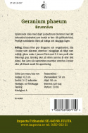 Brunnäva, Geranium o głęboko purpurowych kwiatach na tle delikatnie pierzastych liści.